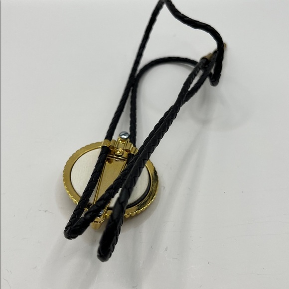 Black and Gold Bolo Tie with Circular Pendant with Star Center Black Braided - Picture 13 of 16